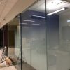 Frameless glass partitions with frost film